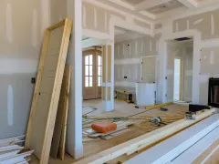 Complete home remodeling in Los Angeles showing full house structure renovation, framing, and second story construction