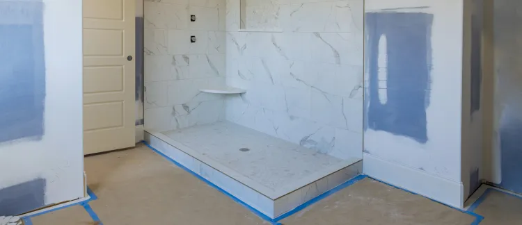 Bathroom remodeling in Los Angeles featuring walk-in shower tile installation, modern design, and renovation in progress