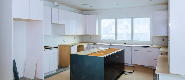 Kitchen remodeling services in Los Angeles showing custom cabinets, island construction, and full kitchen renovation process